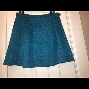 Vivid turquoise skater skirt.